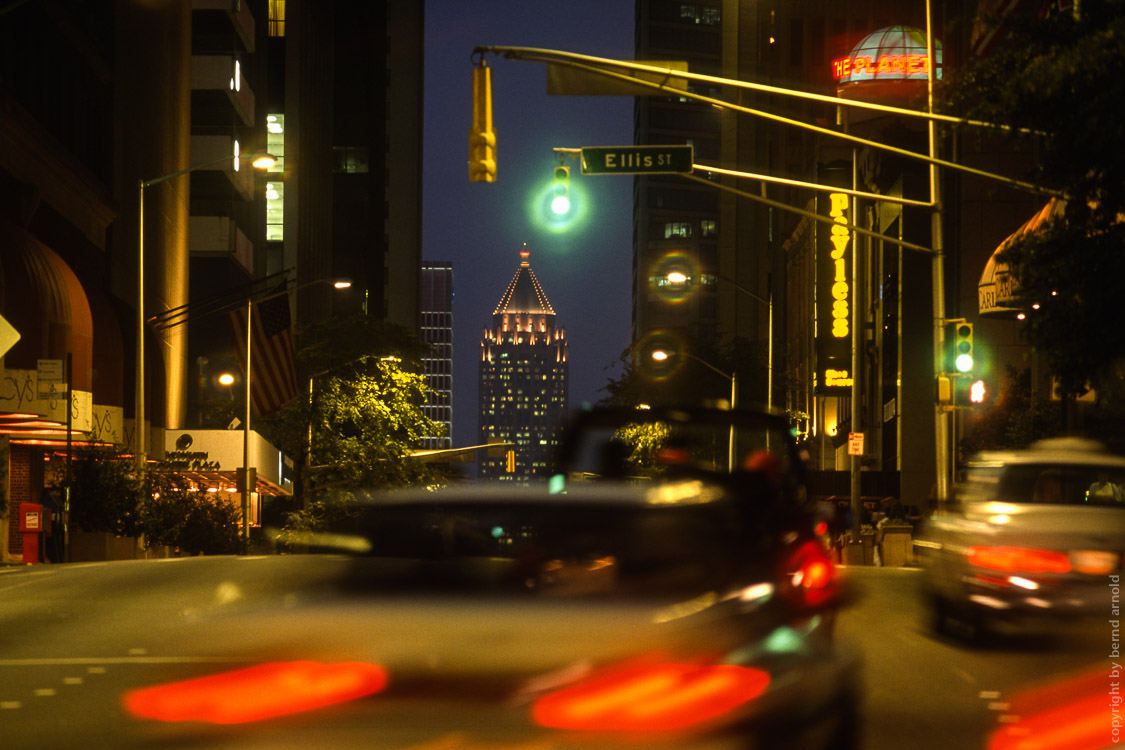 Atlanta street with cars by night 