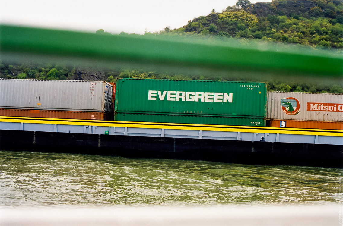 Ship at Rhine river with Evergreen
